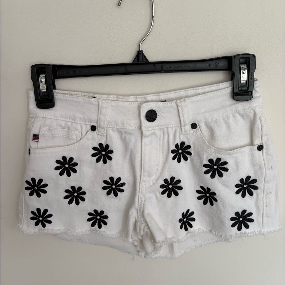 White Girl’s cut off Shorts with daisies